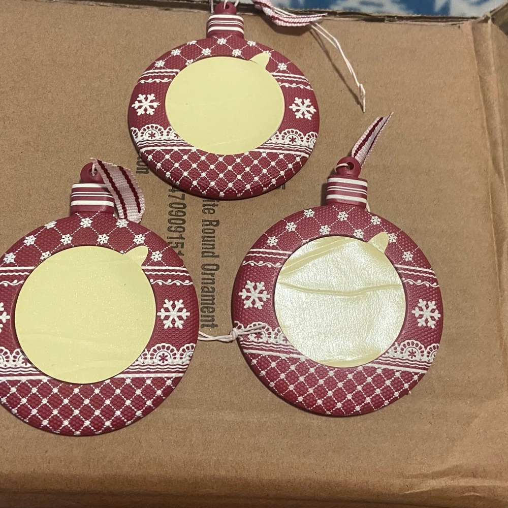19 2.75” round poly resin ornaments.